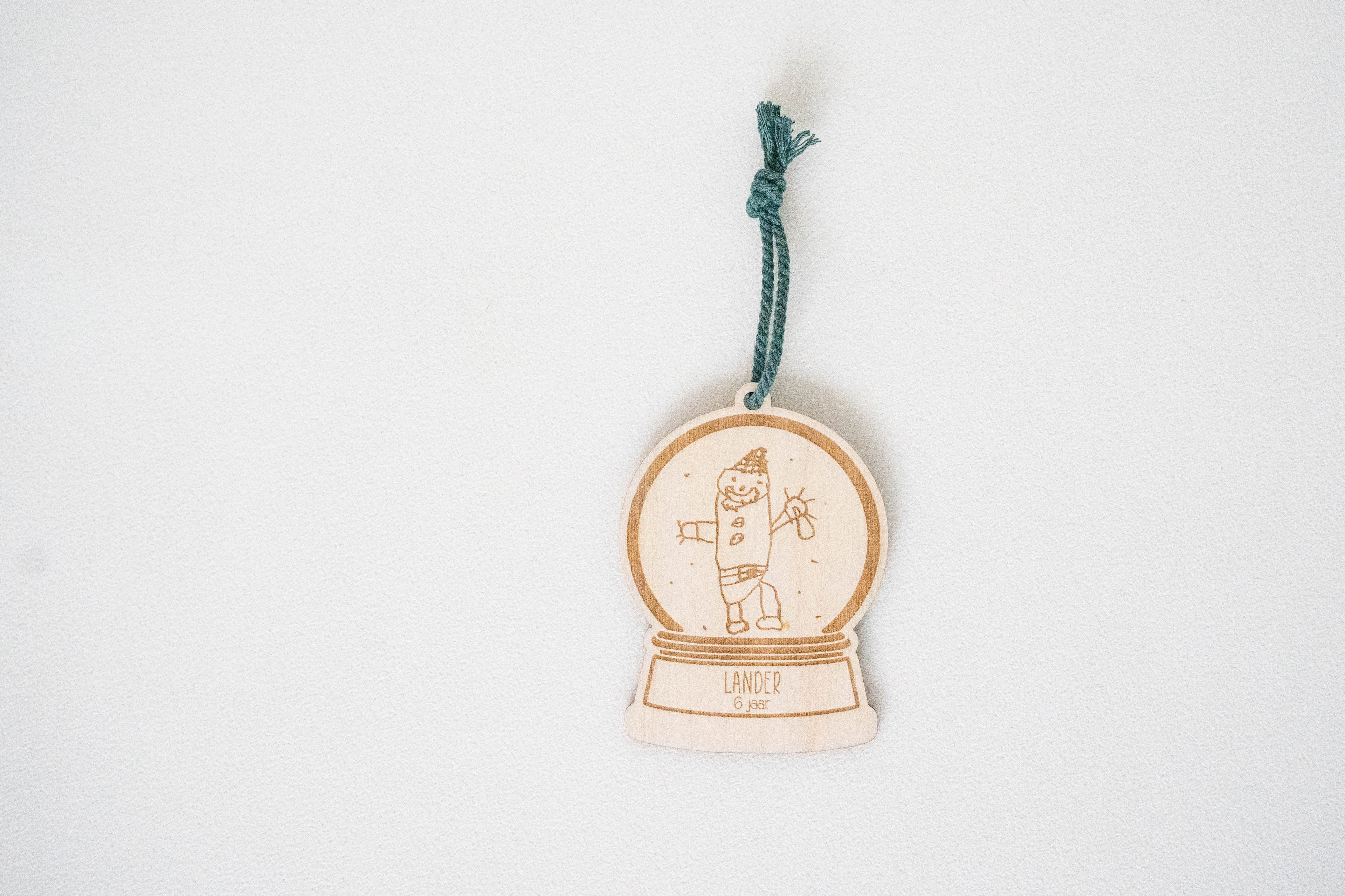 Sneeuwbol hout met tekening kind